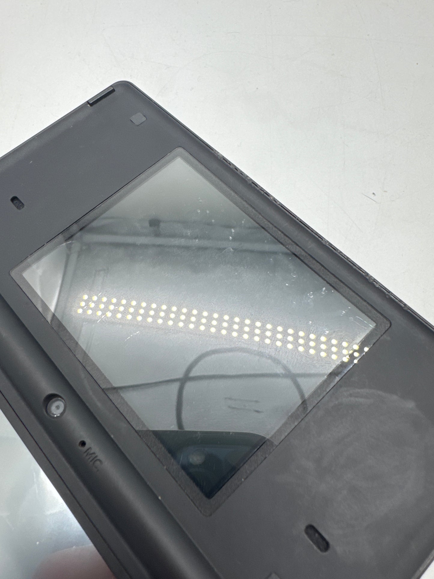 Nintendo DSi TWL-001(USA) Black Console Only #357 Spots on Top Display AS IS