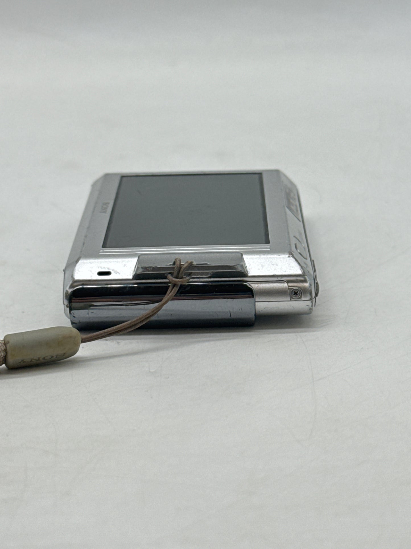 Untested Sony Cyber-shot DSC-T90 12.1MP Digital Camera Only Silver - No Battery