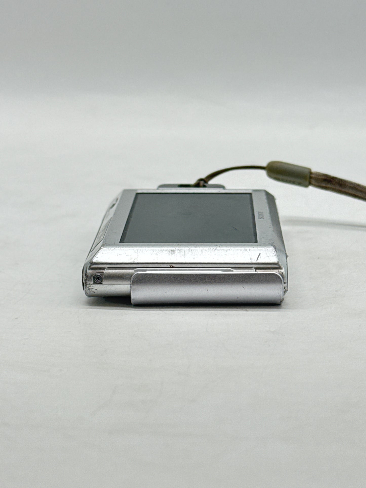 Untested Sony Cyber-shot DSC-T90 12.1MP Digital Camera Only Silver - No Battery