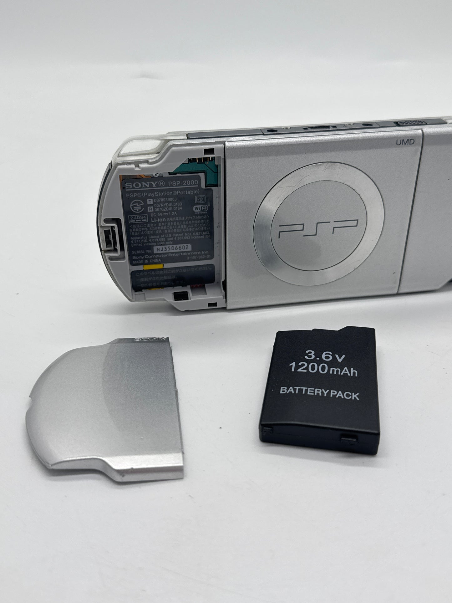 Sony PSP-2000 Silver Console #84 w/1200mAh Battery & No Charger