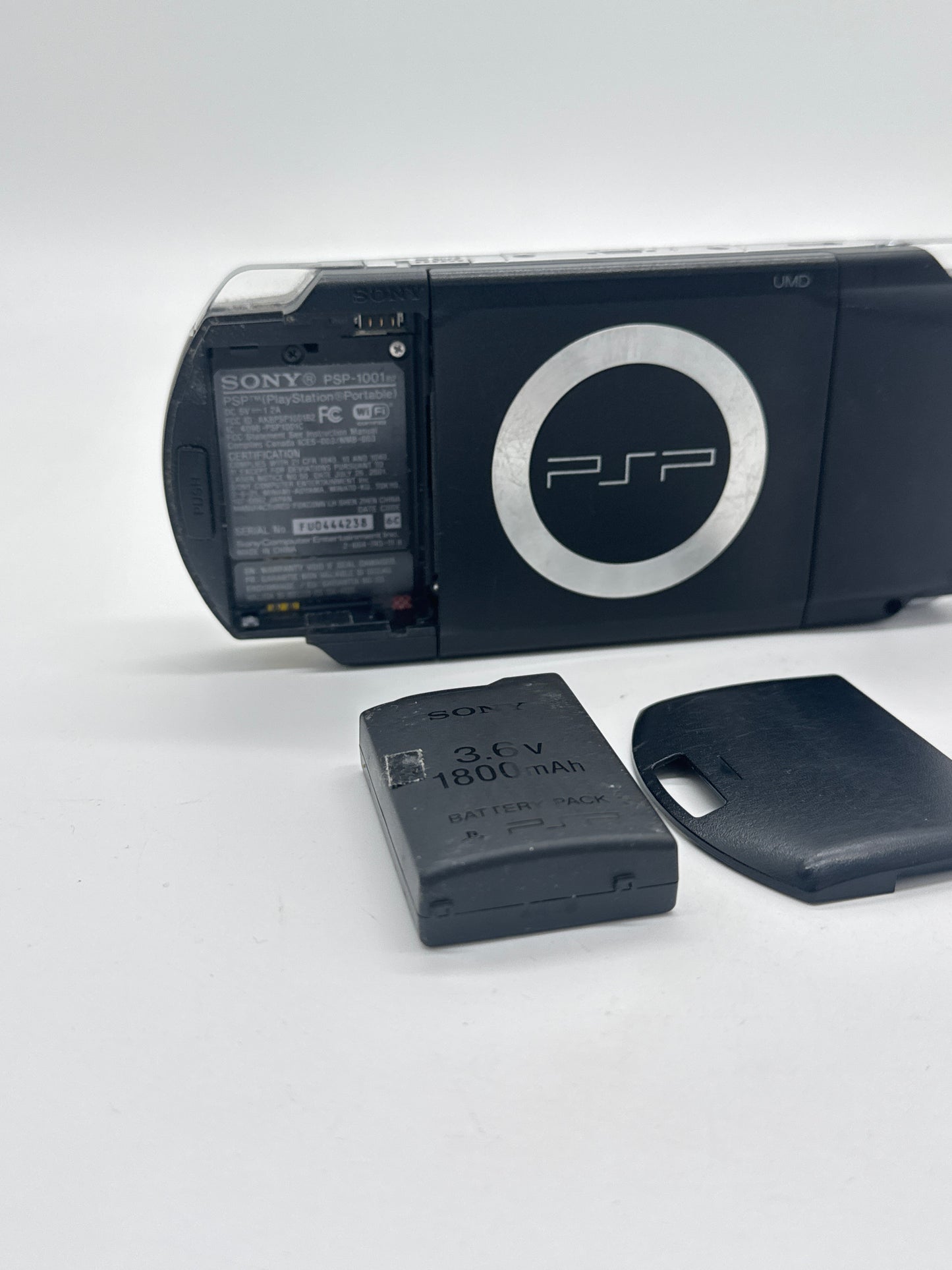Sony PSP-1001B2 Black Console #83 Cracked Front Case