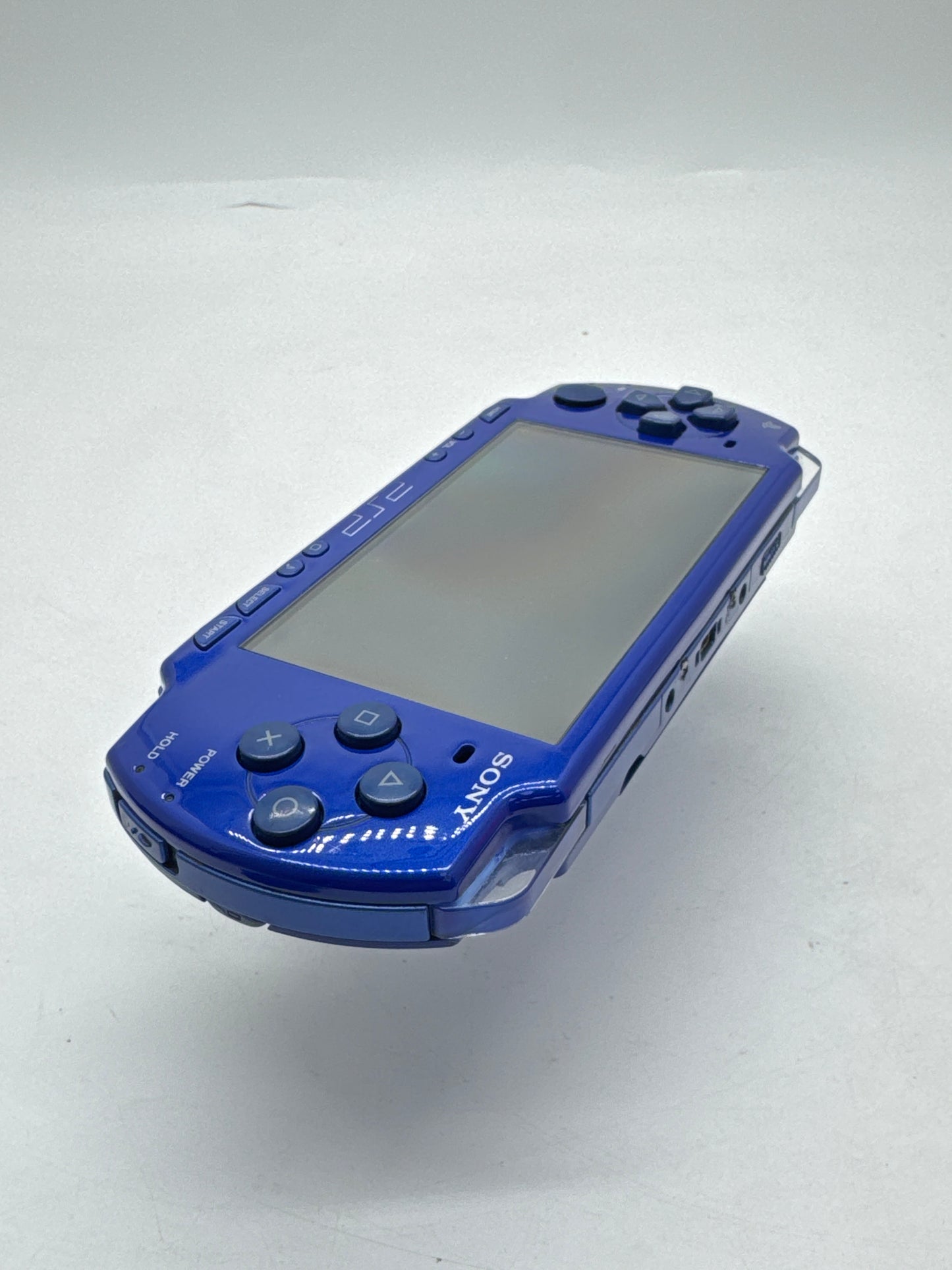 Sony PlayStation PSP-2000 Blue Console Only #375 No Back Lid Spot on Display READ AS IS