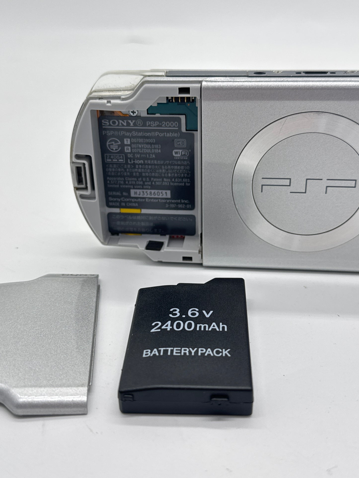 Sony PSP-2000 Silver Console #87 w/2400mAh Battery & No Charger
