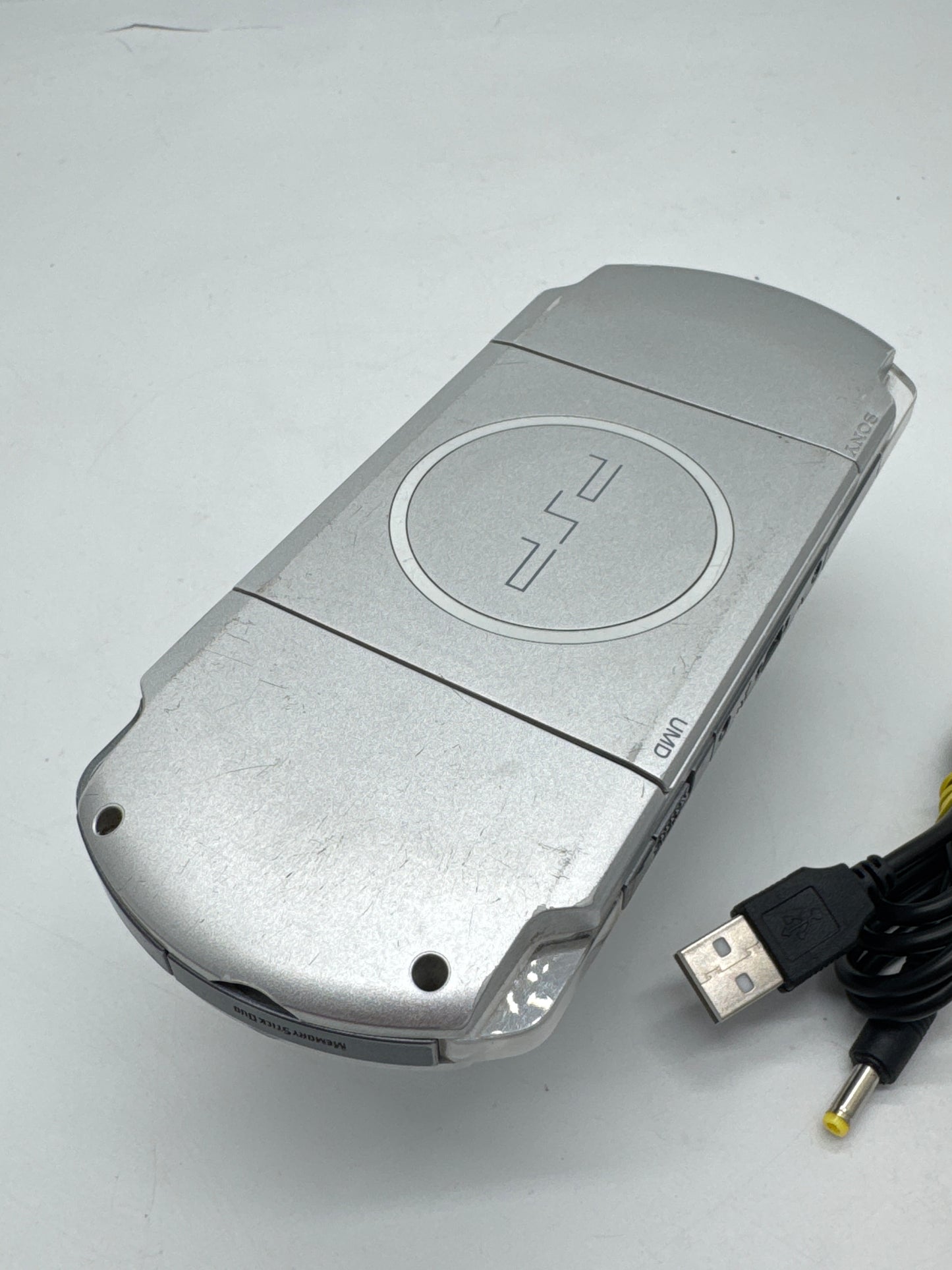 Sony PSP-3000 Silver Console #34 w/ 1200mAh Battery & Charger BAD UMD READ AS IS