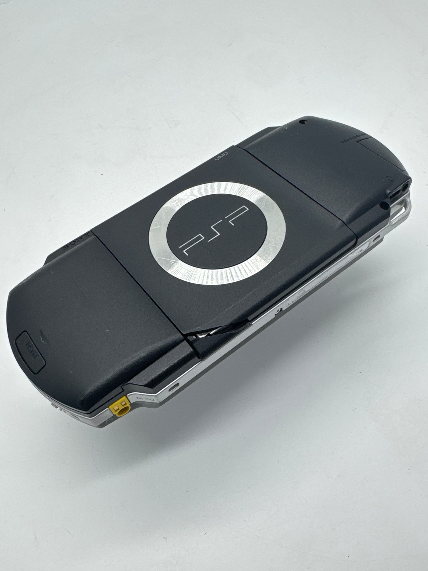 Sony PSP-1000 Piano Black Console #79 No Charger Cracked Back Bad Disc Drive AS IS