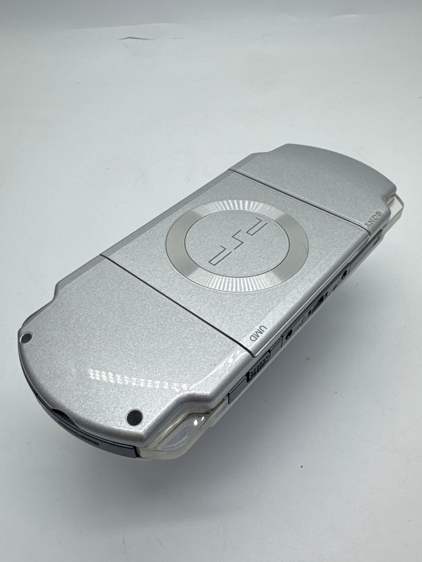 Sony PSP-2000 Silver Console #297 w/1200mAh Battery No Charger BAD UMD DRIVE AS IS