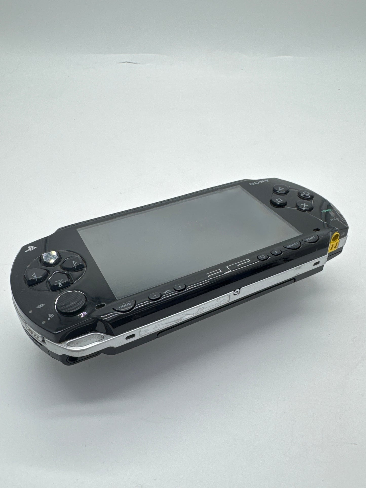 Sony PSP-1001B2 Black Console #83 Cracked Front Case