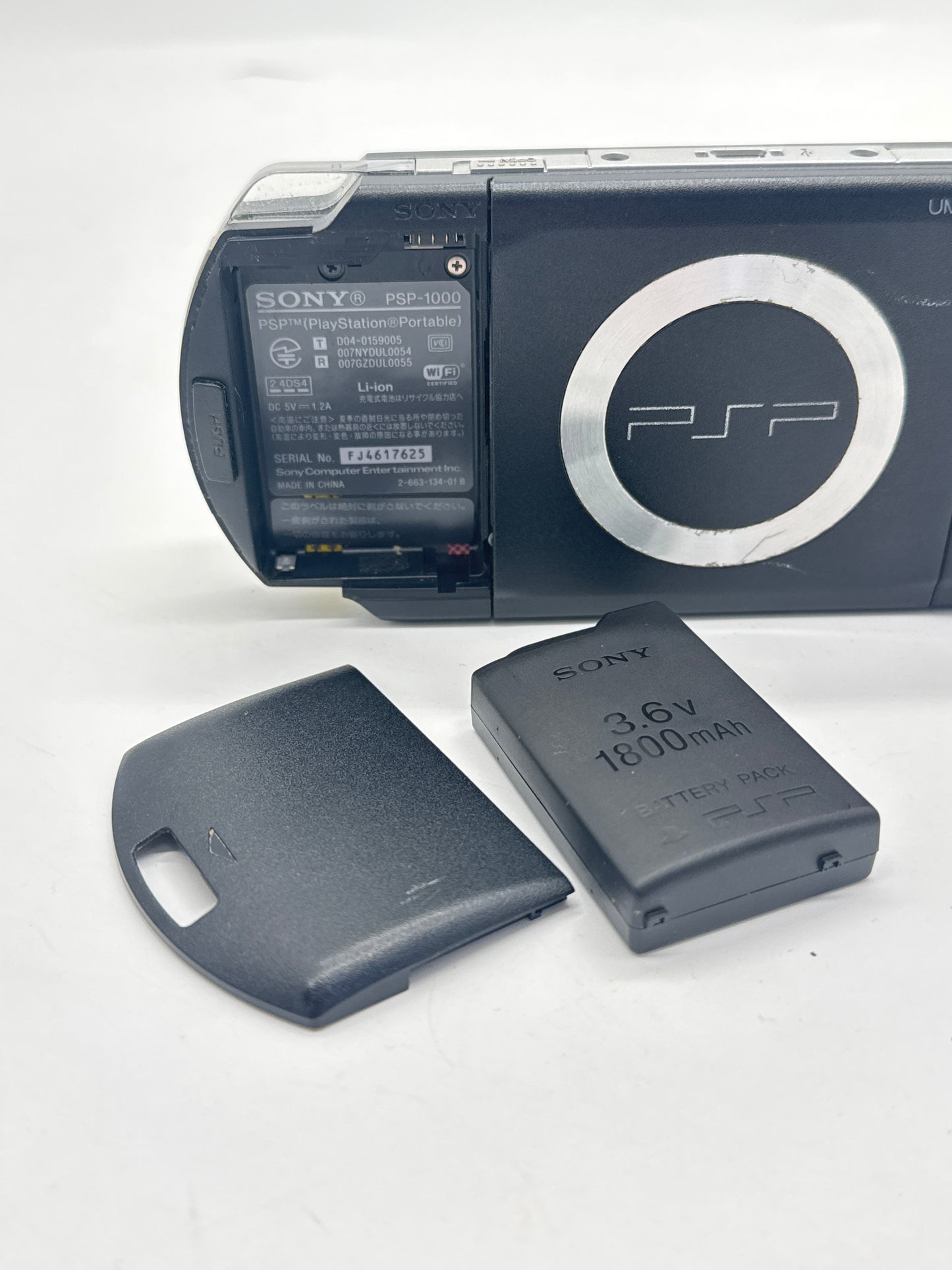 Sony PSP-1000 Piano Black Console #299 w/1800mAh Battery No Charger BAD UMD AS IS