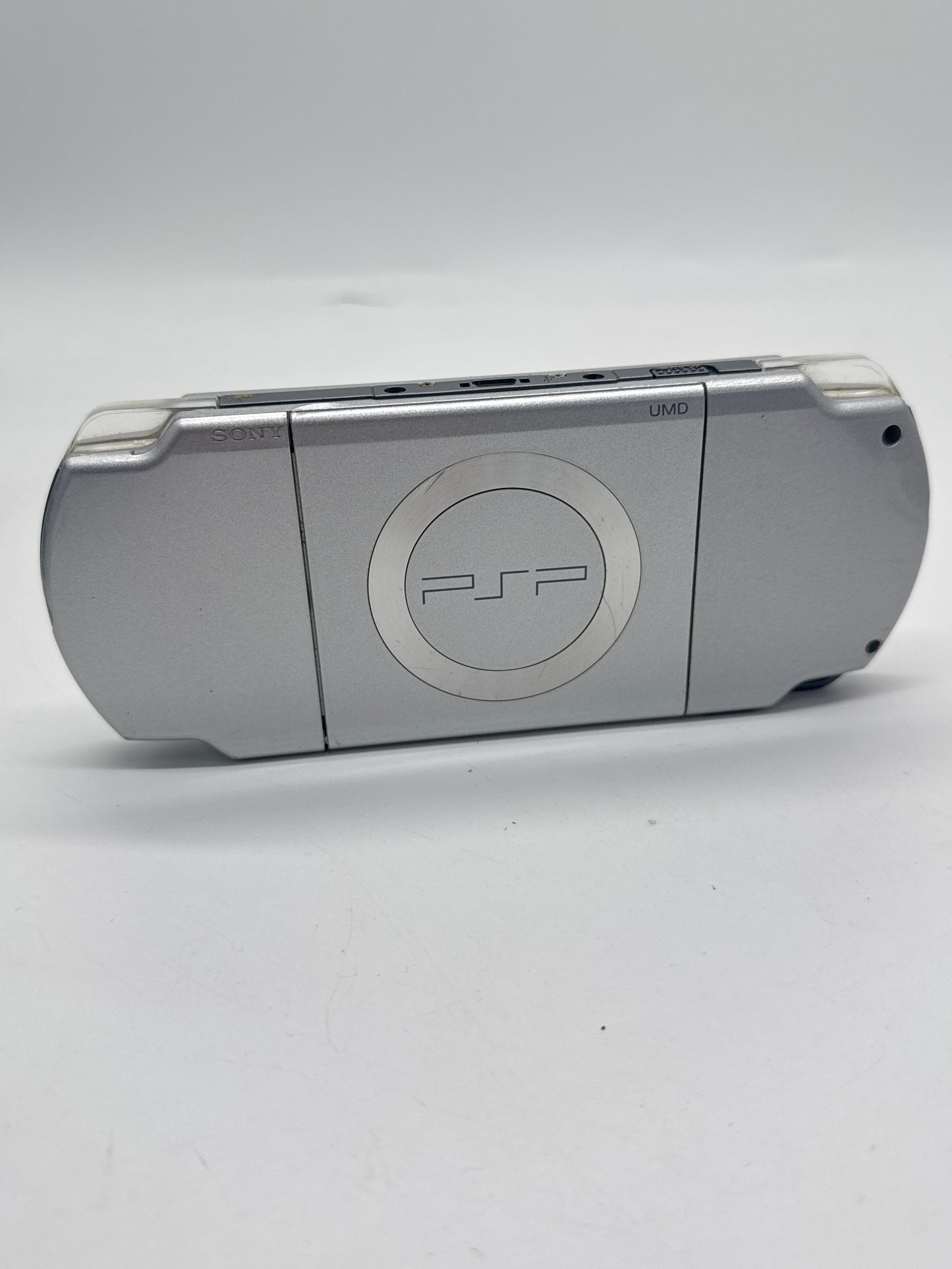 Sony PSP-2000 Silver Console #297 w/1200mAh Battery No Charger BAD UMD DRIVE AS IS