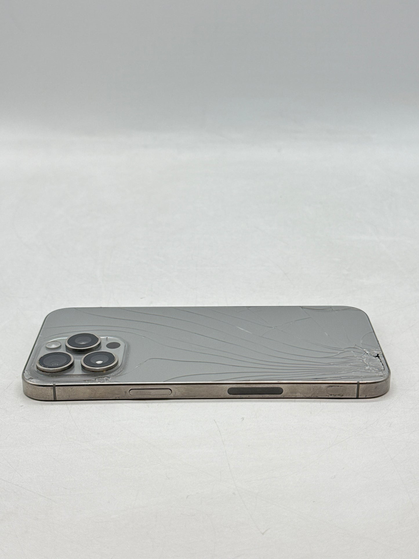 Unlocked Apple iPhone 15 Pro Max A2849 1TB Natural Titanium - Cracked Read!